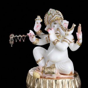 Playing instrument lord  Ganpati