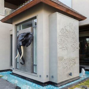 walll mounted elephant face sculpture