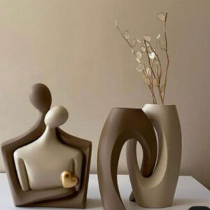 marble couple sculpture with flower pot